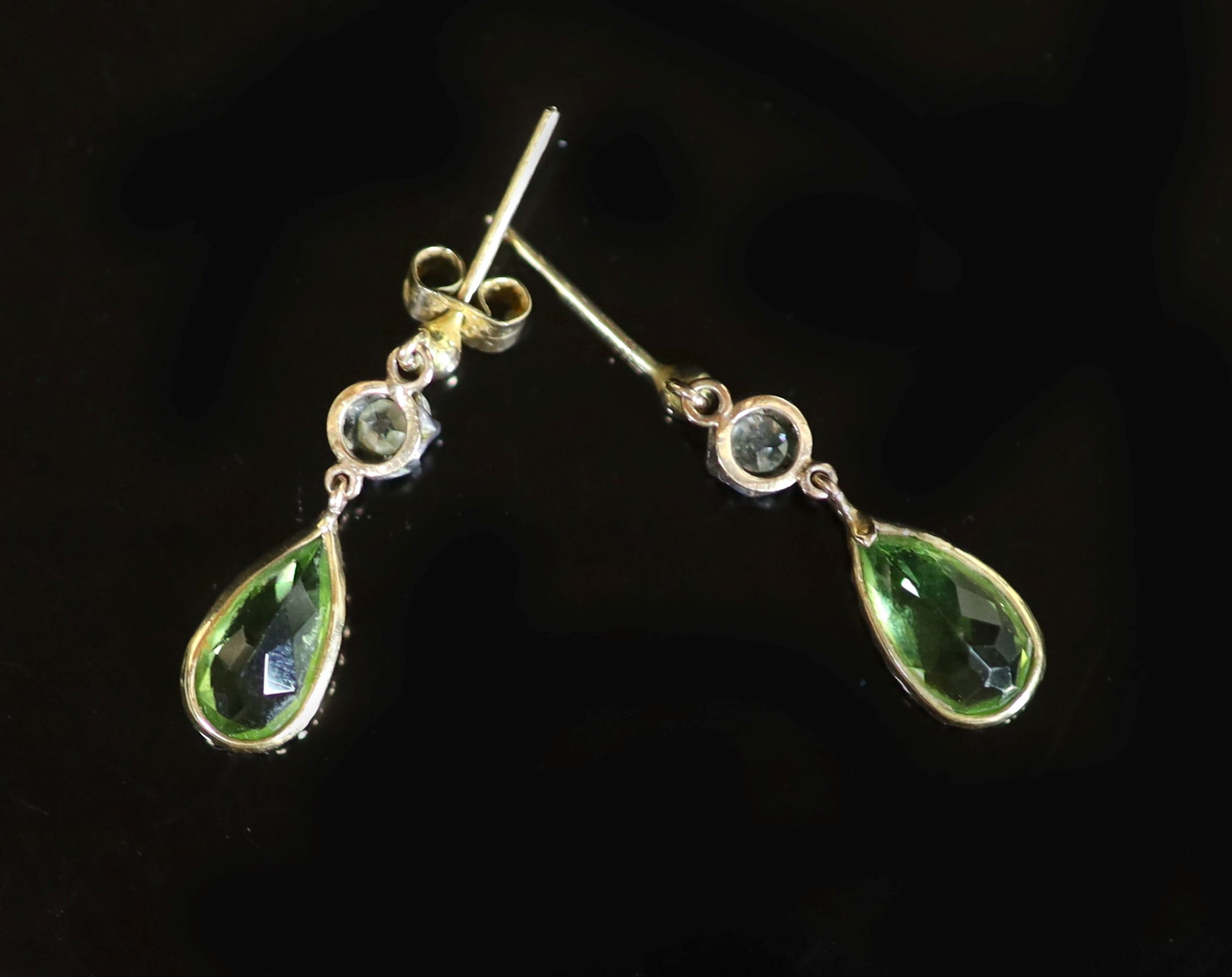 A pair of early 20th century gold, peridot and diamond set drop earrings